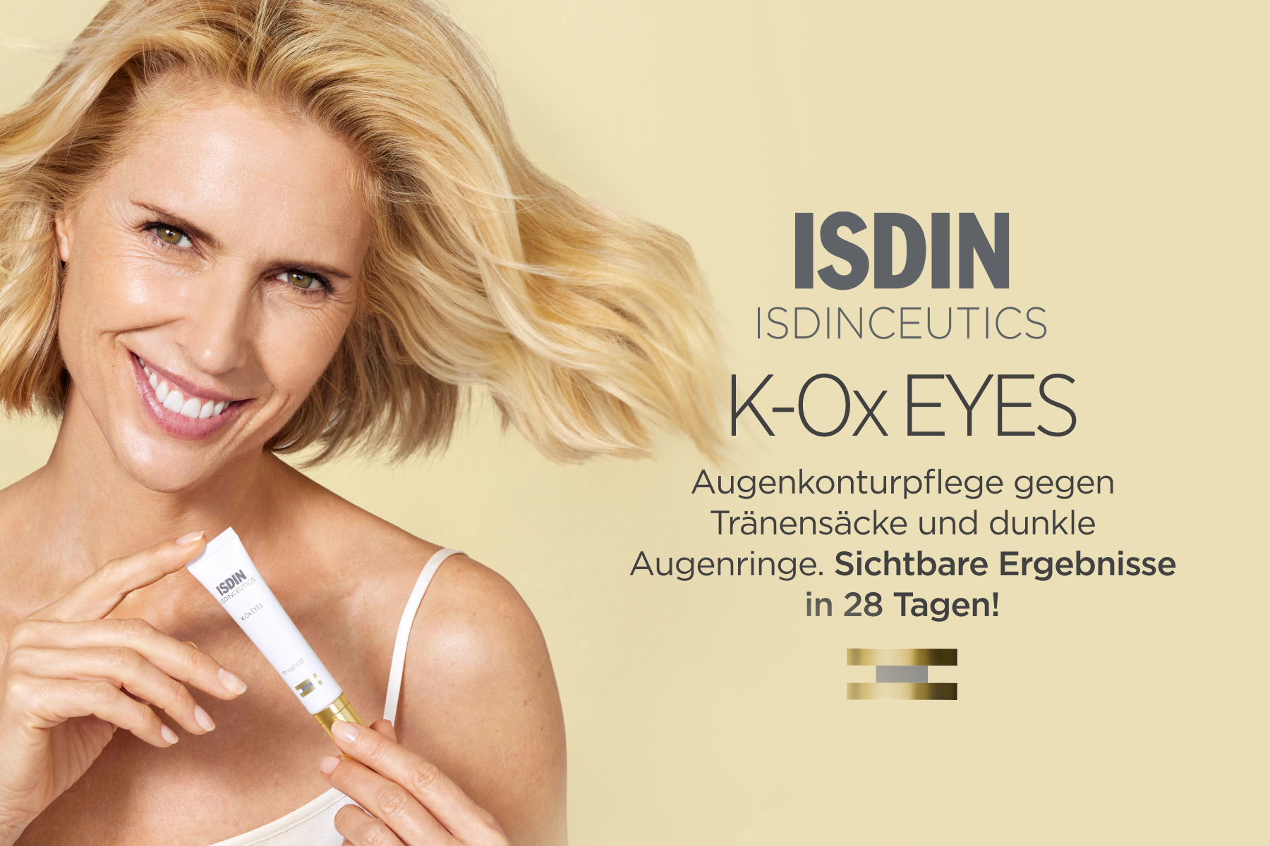 Frau mit blonden Haaren hält Isdin Isdinceutics K-ox Eyes Augencreme. Text: Sichtbare Ergebnisse in 28 Tagen.
